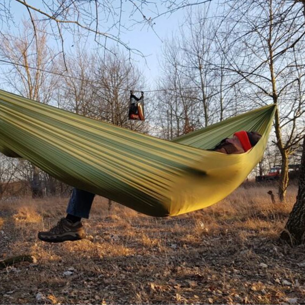 Bushmen Ultralight Hammock (Green) set up in woods