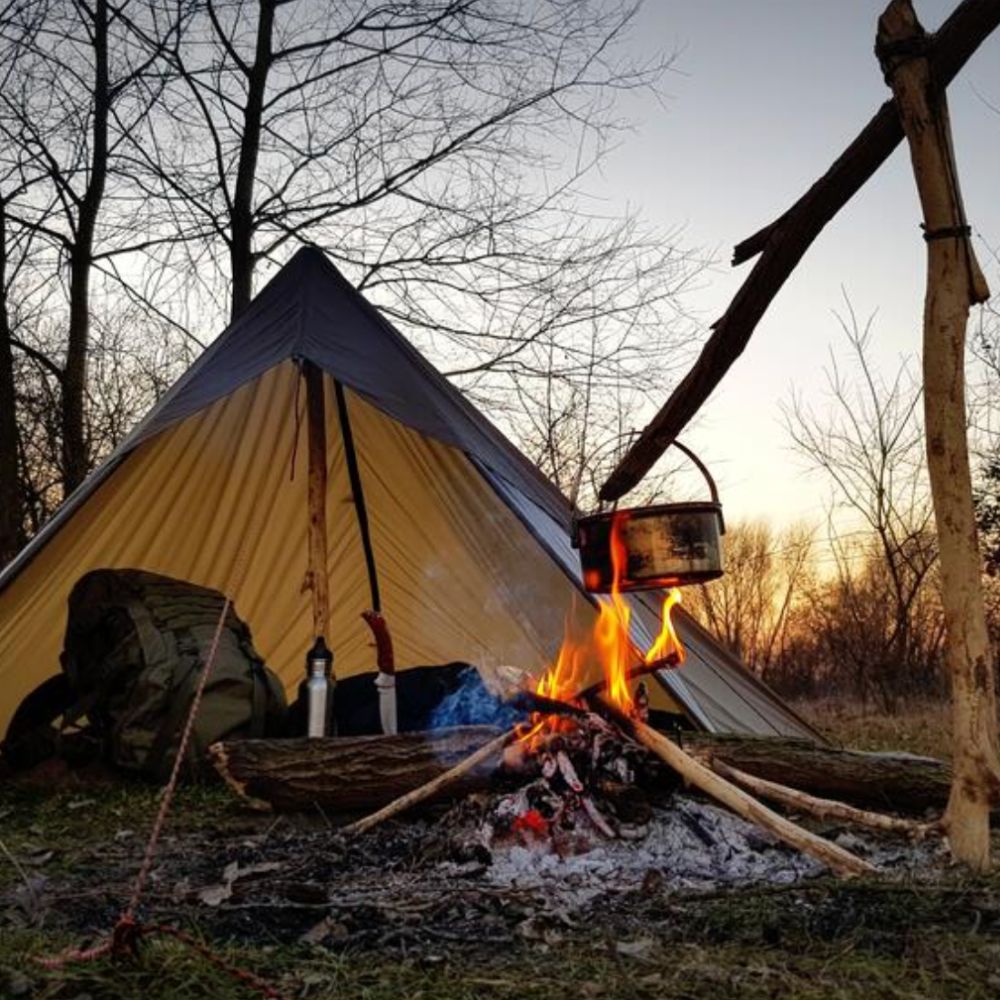 Bushmen 3×3m Ultralight Tarp (Dark Olive) shelter next to camp fire