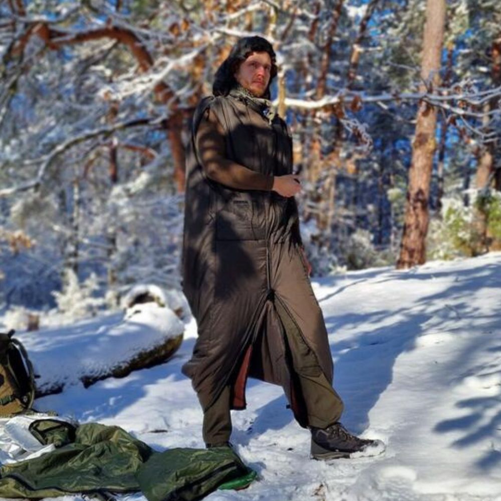 Bushmen Walker 1L Sleeping Bag (Olive) being used in the snow