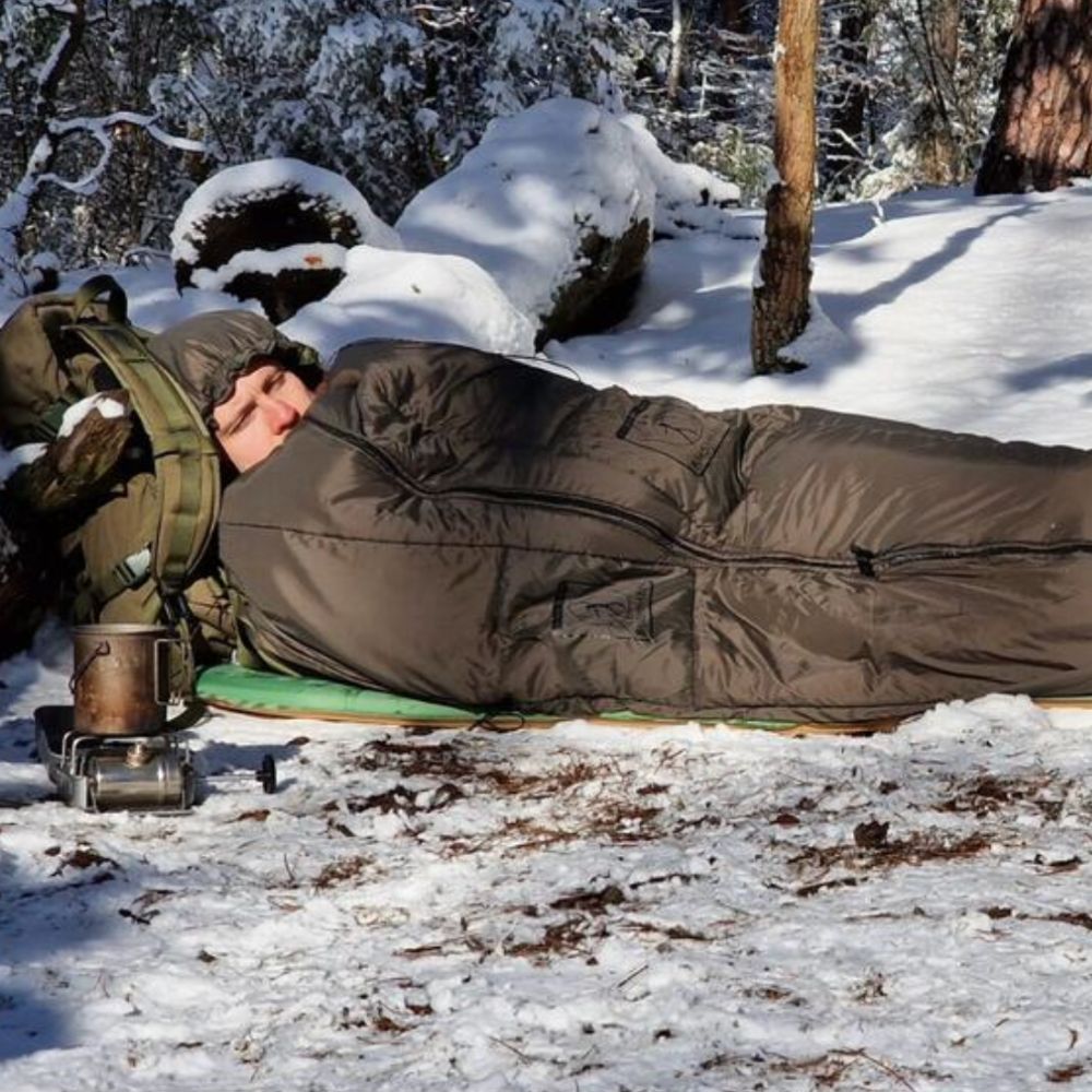 Bushmen Walker 3L Sleeping Bag (Olive) in the snow
