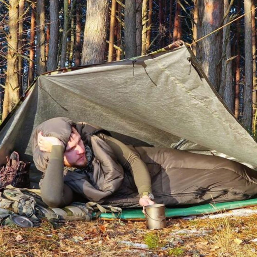Bushmen Walker 3L Sleeping Bag (Olive) under tarp