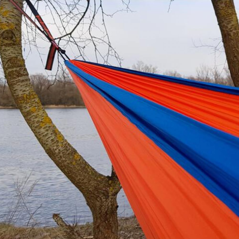 Bushmen ZEN Hammock (Orange) hanging from tree