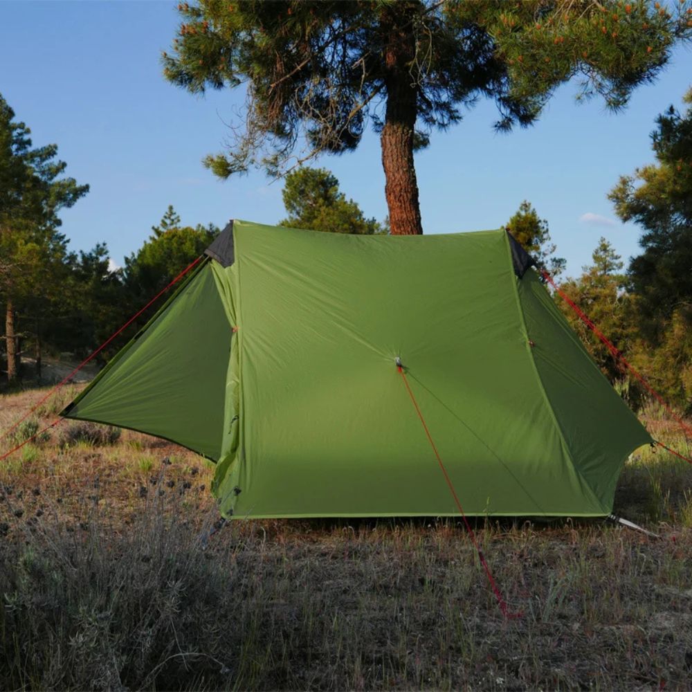 FLAME’S CREED Lanshan 2 Person Ultralight Backpacking Tent (Green, 15D) pitched in field