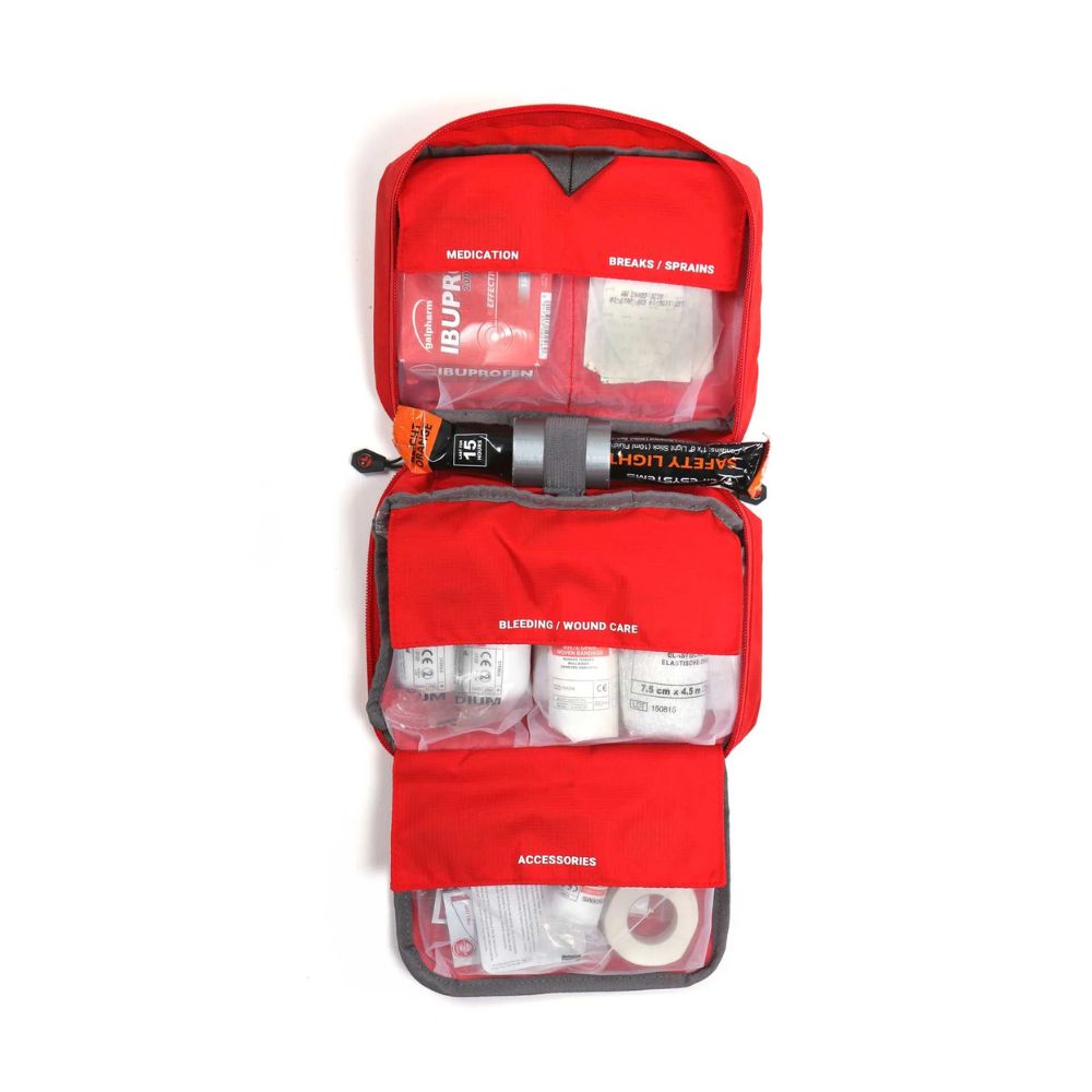 Lifesystems Mountain First Aid Kit with various supplies on a white background