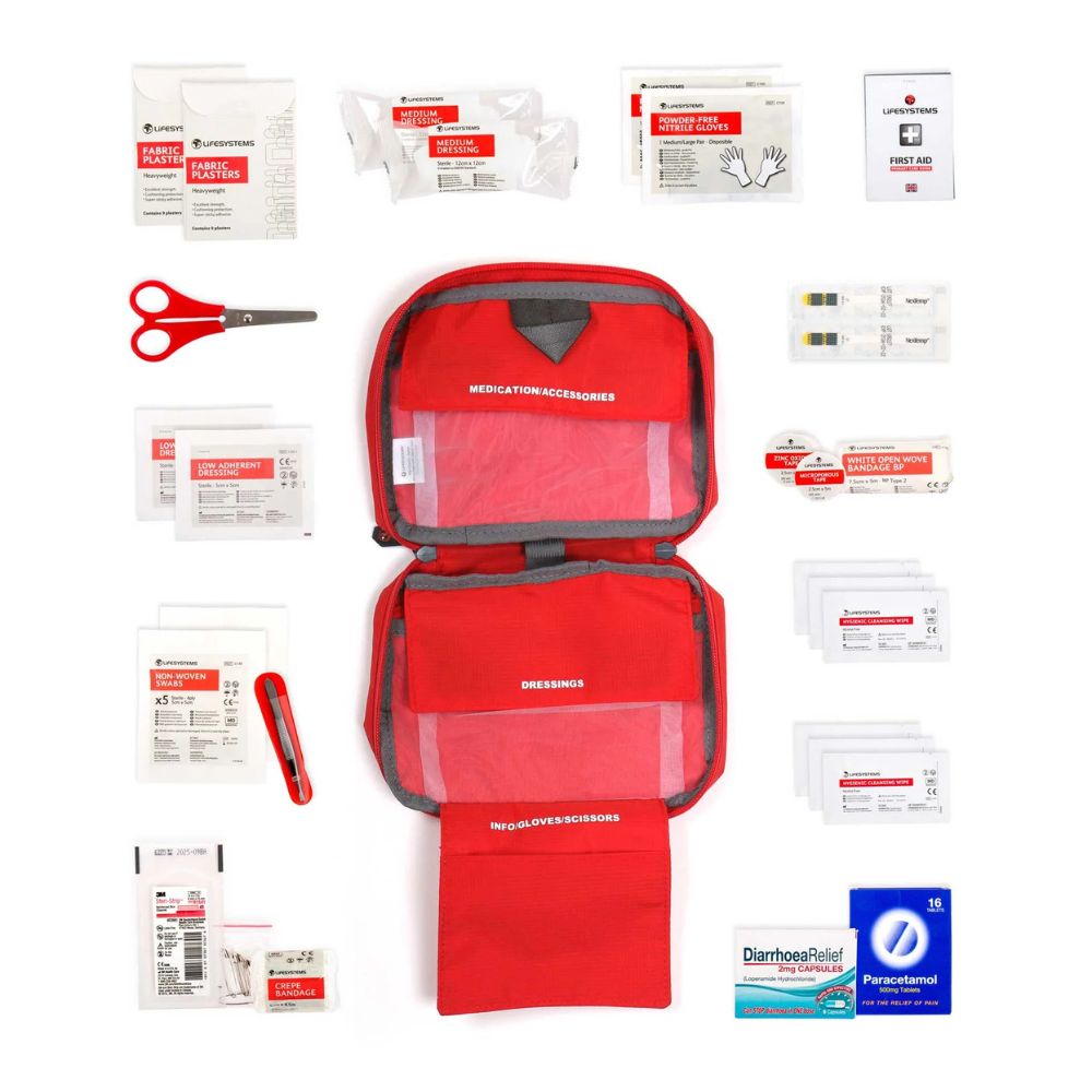 Lifesystems Traveller First Aid Kit with various medical supplies on a white background