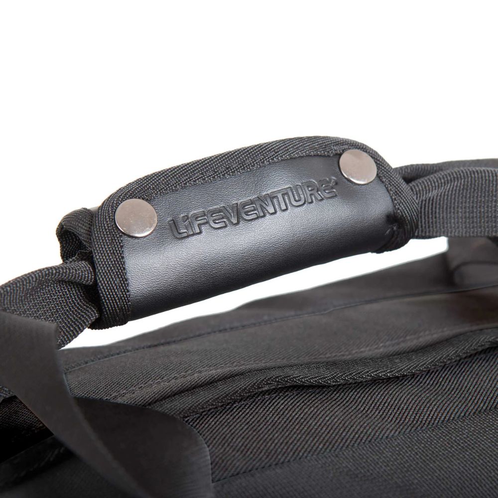 Close-up of a black bag with a Lifeventure strap and logo on a white background