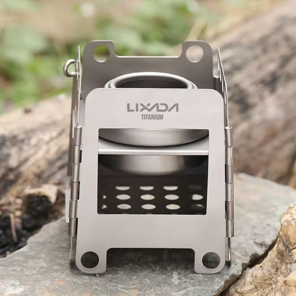 Lixada Lightweight Titanium Folding Wood Stove in the woods