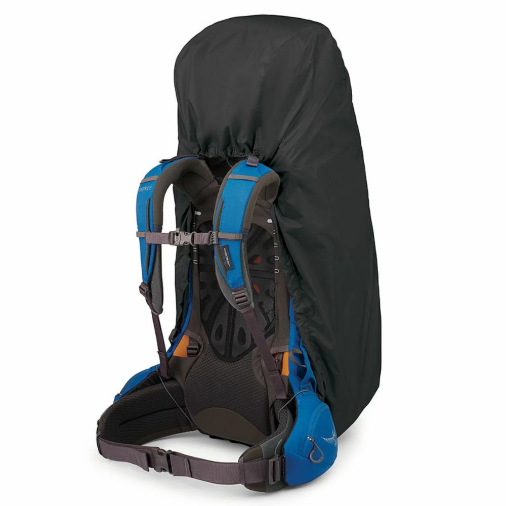 Blue and black backpack with a rain cover on a white background