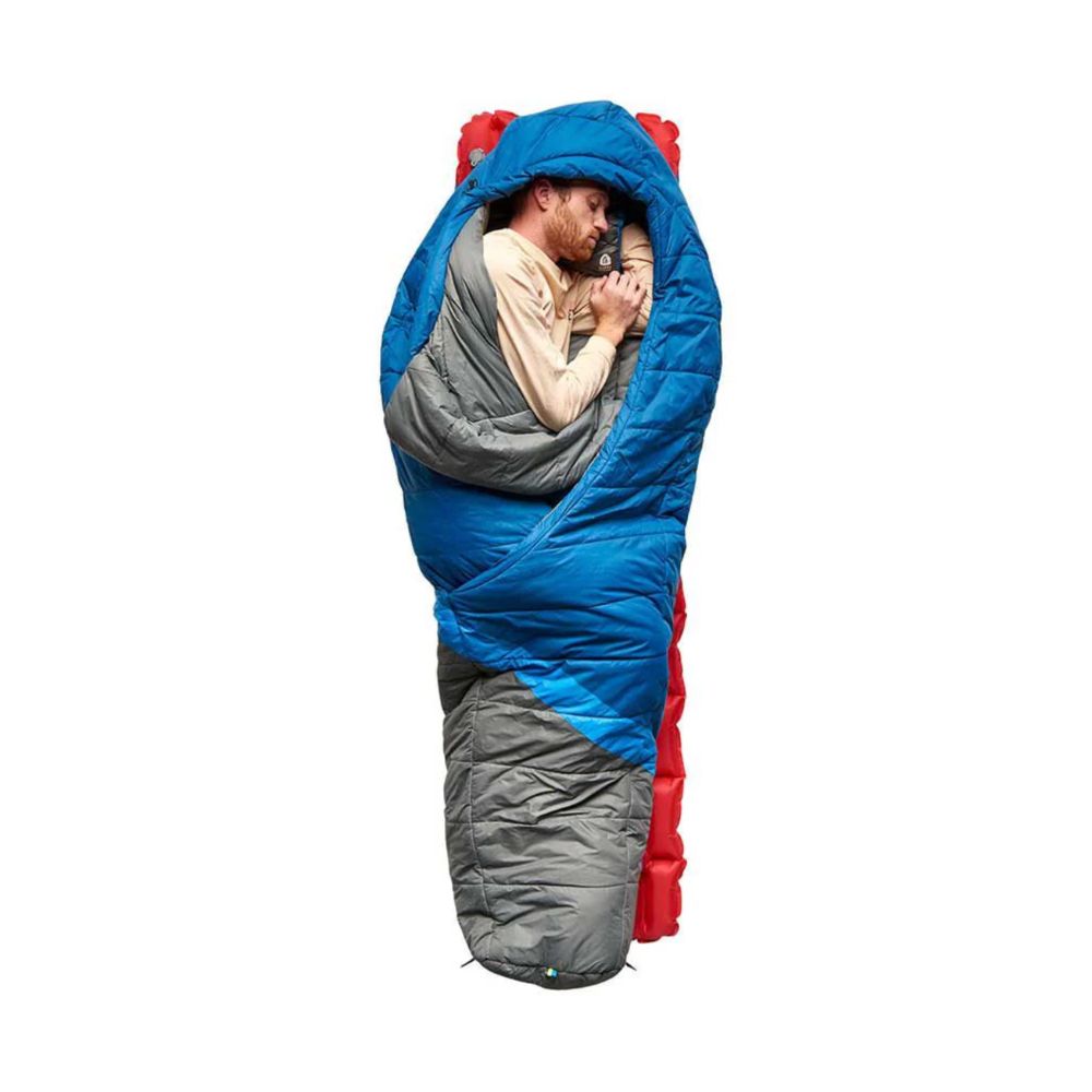 Person sleeping in a blue and gray sleeping bag on a white background