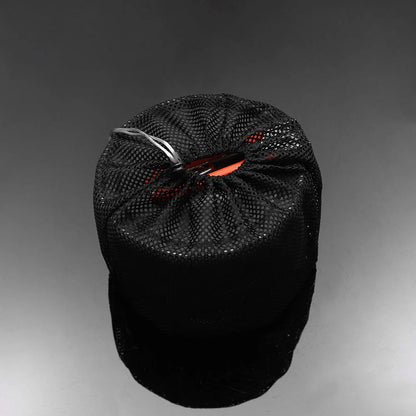 Black drawstring bag on a gray background