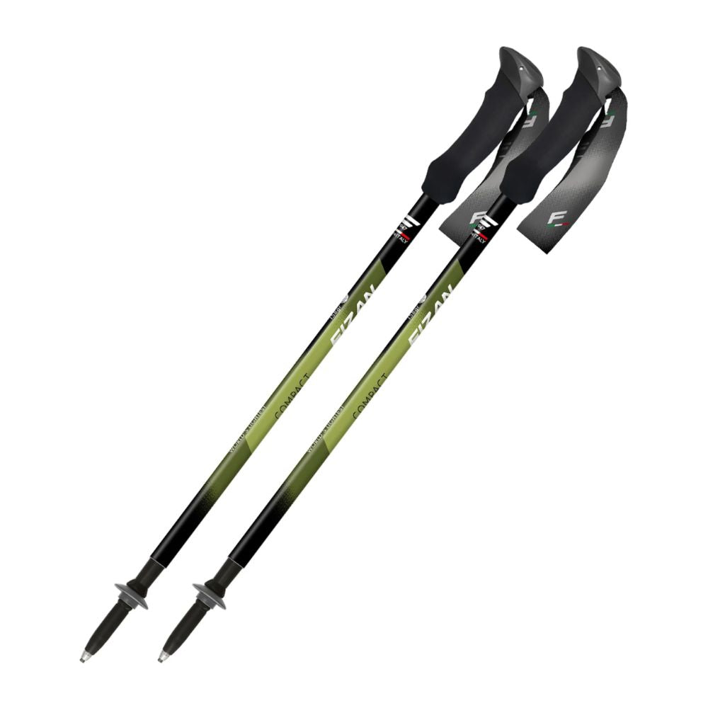 Two green and black hiking poles on a white background