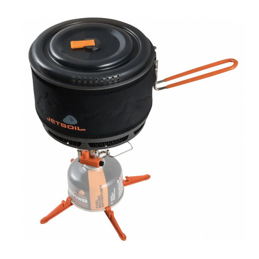 Portable camping stove with black container and orange accents on a white background
