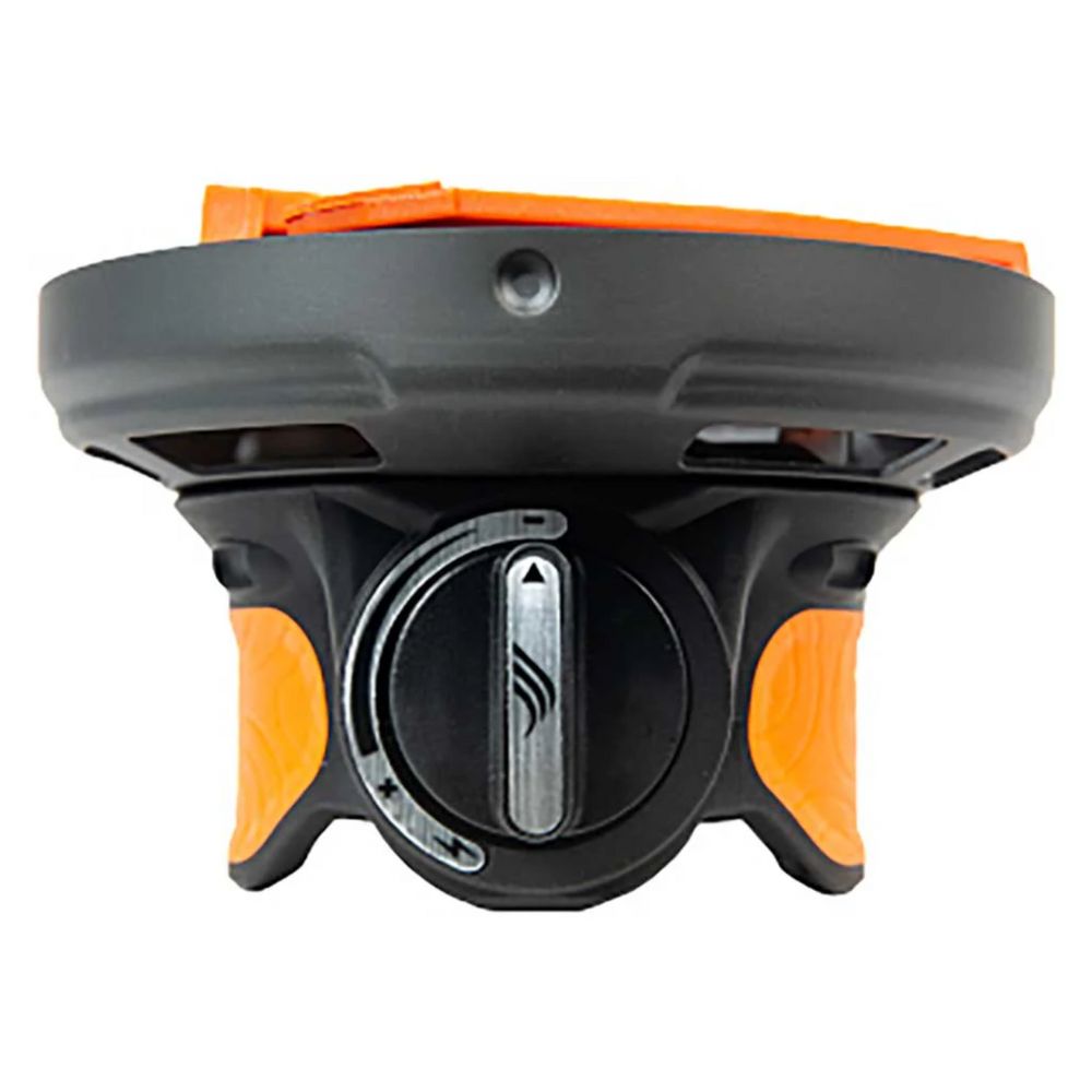Close-up of a black and orange device on a white background