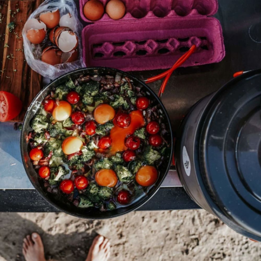 Salad with eggs and vegetables on a beach setting