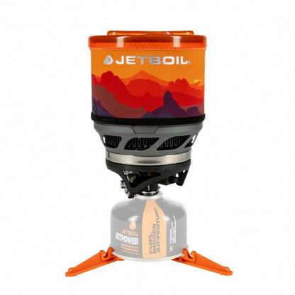 Jetboil stove with colorful top on a white background