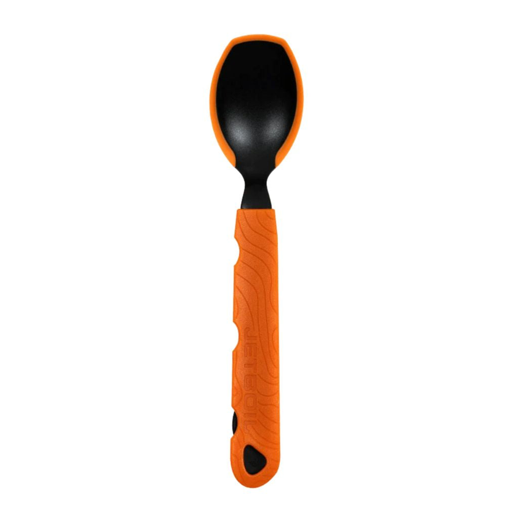 Orange and black spoon on a white background