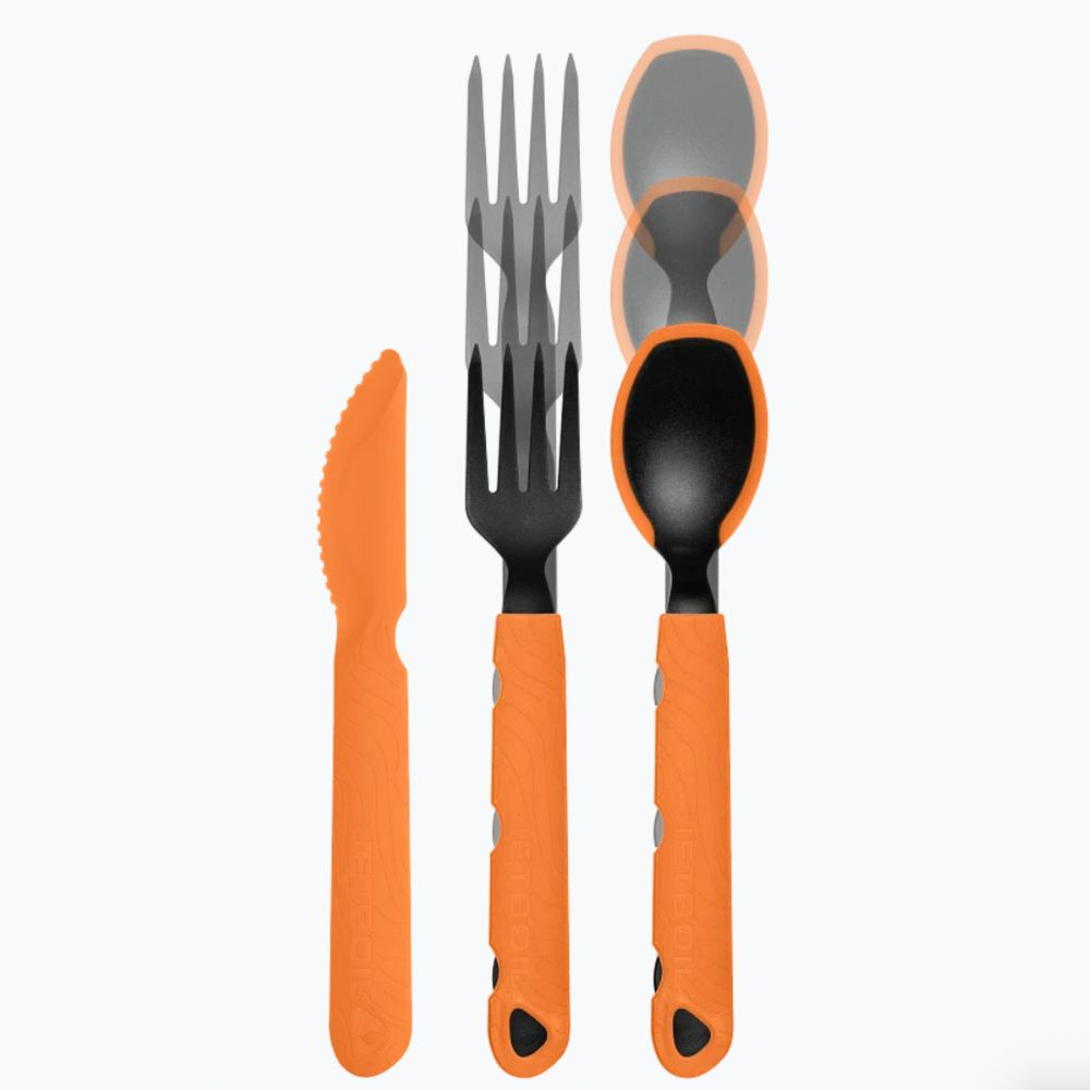Set of camping cutlery with orange handles on a white background