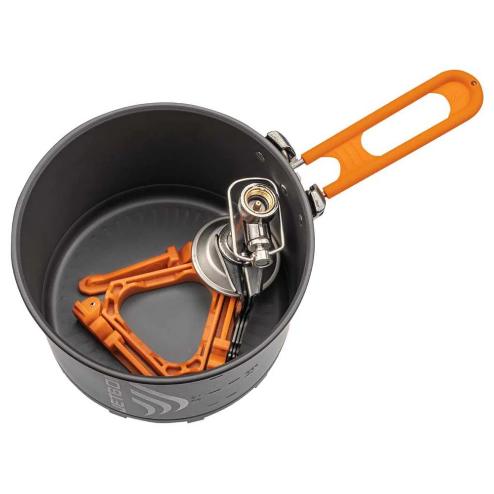 Camping cookware set with orange handles on a white background