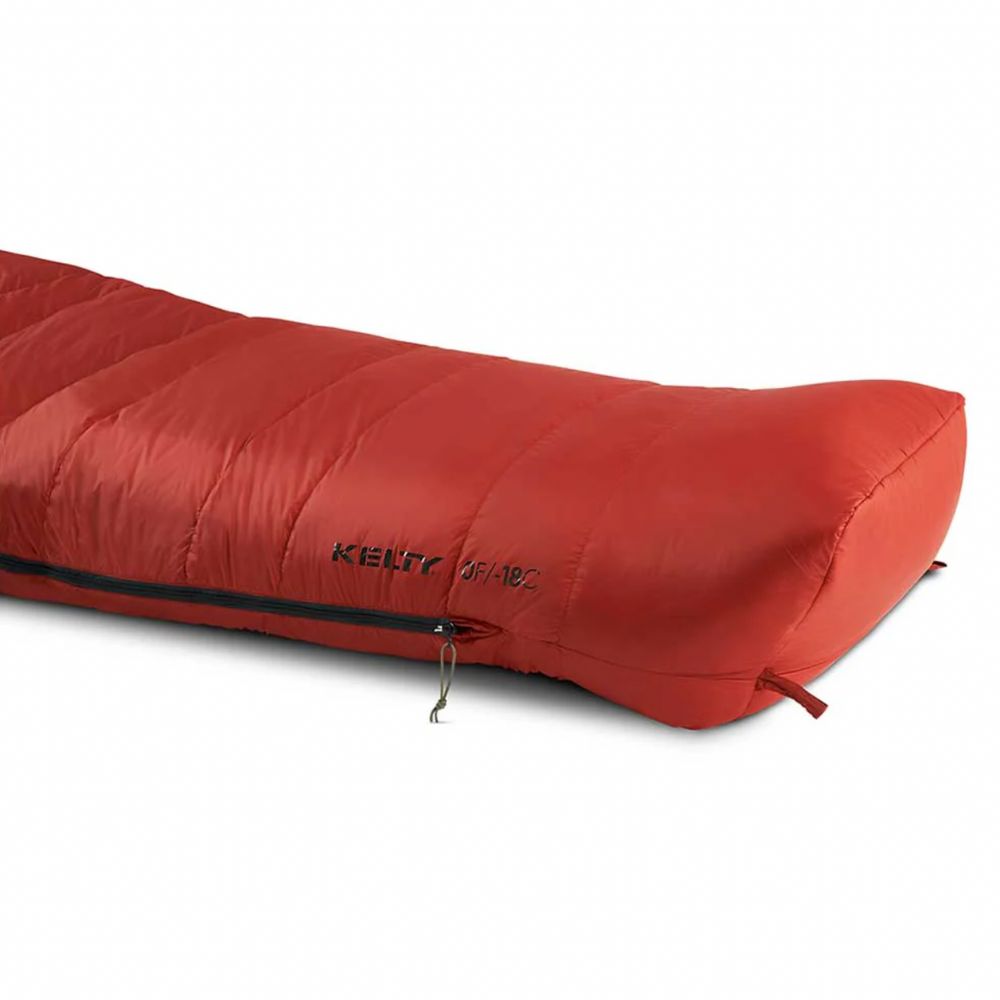 Red sleeping bag with 'Kelty' branding on a white background