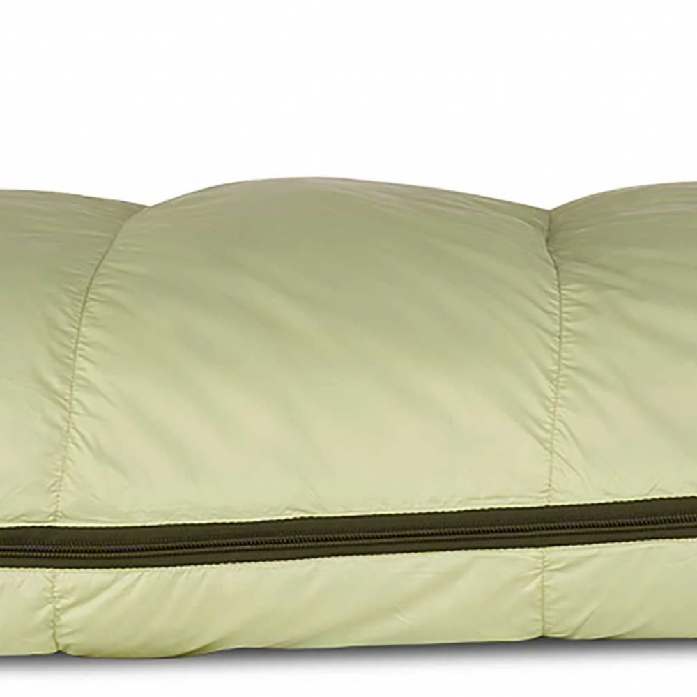 Light green quilt with a zipper on a white background