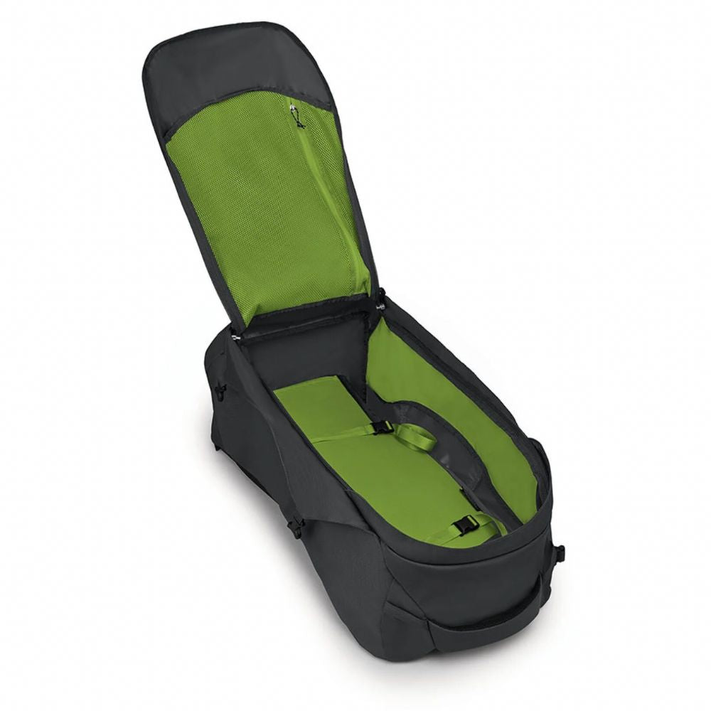 Black and green baby seat with open lid on a white background