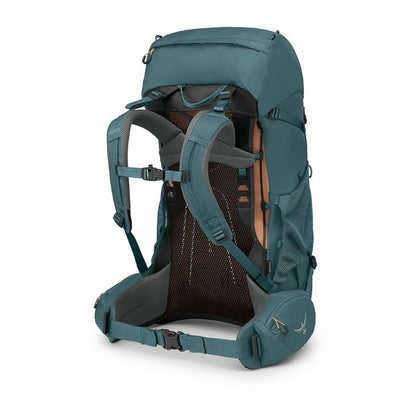 A large hiking backpack in a muted teal color, shown from the rear three-quarter view to display the padded hip belt, ventilation mesh back, and side compression straps against a plain white background.