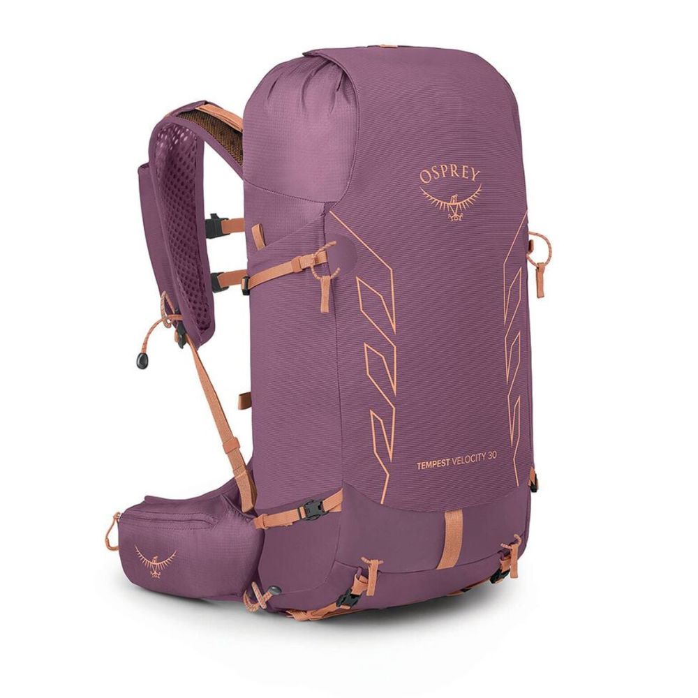 An Osprey Tempest Velocity 30 backpack in a dusty purple color with rose gold accents, shown from a three-quarter angle on a white background.