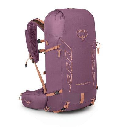 An Osprey Tempest Velocity 30 backpack in a dusty purple color with rose gold accents, shown from a three-quarter angle on a white background.