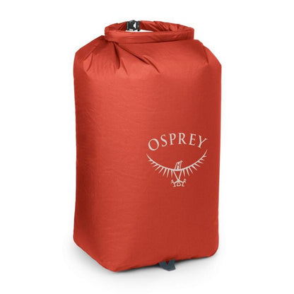 Red Osprey dry bag on a white background