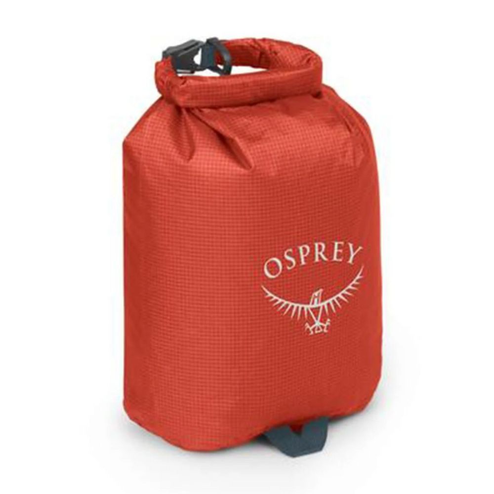 Red Osprey dry bag on a white background