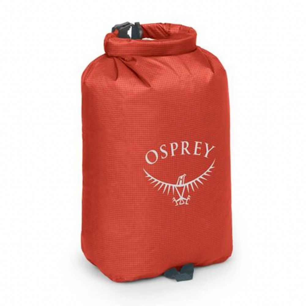 Red Osprey dry bag on a white background