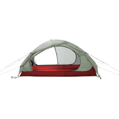 A two-person dome camping tent with a sage green fly sheet and a red ground sheet, shown from the front on a solid white background.