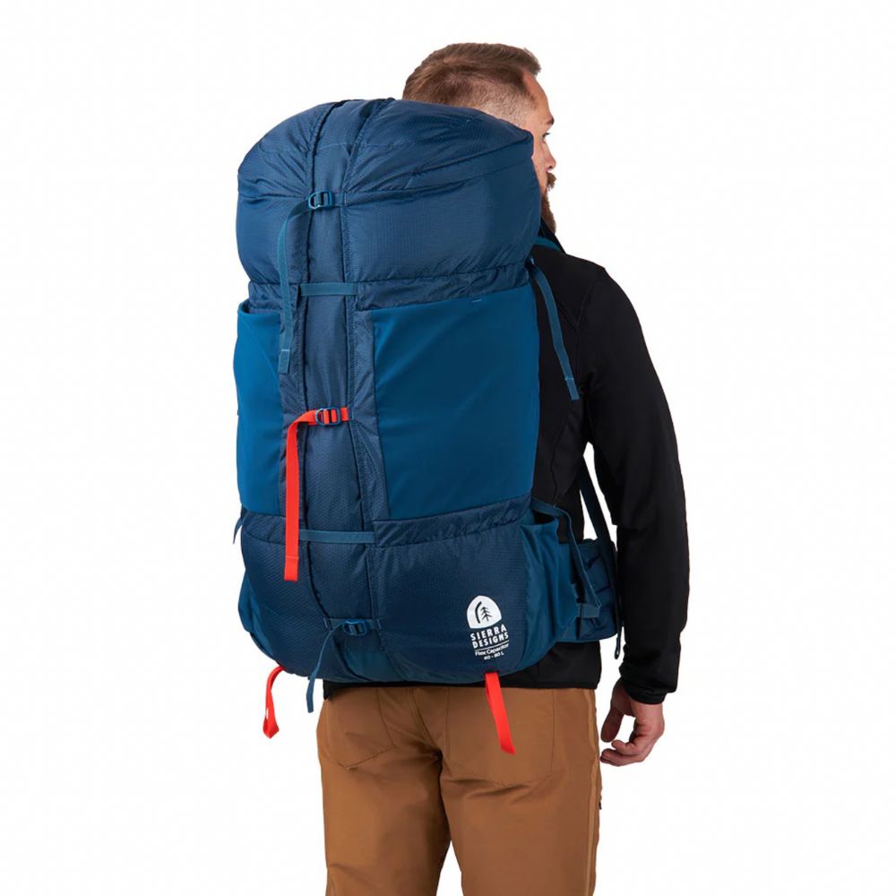 Sierra Designs Flex Capacitor 40-60L Backpack (Majolica Blue) being worn by man