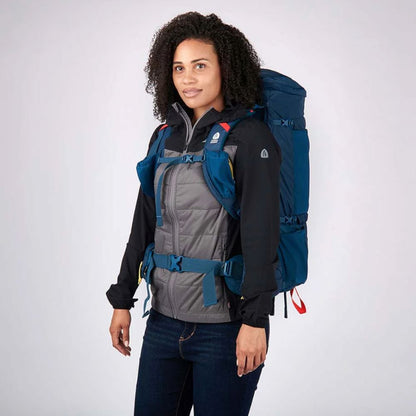 Sierra Designs Flex Capacitor 40-60L Backpack (Majolica Blue) being worn by woman